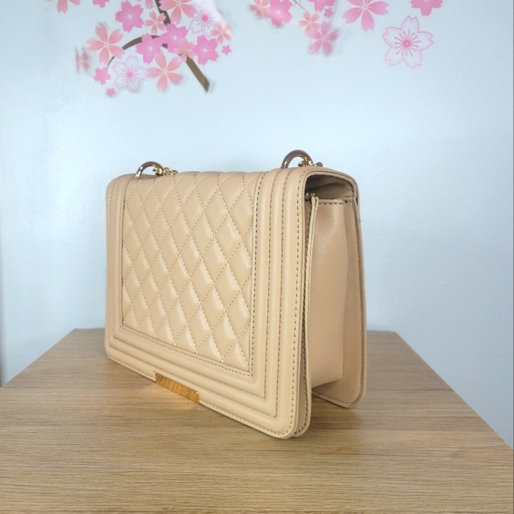 Quilted classy elegant tan purse with gold chain